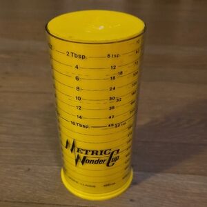Milmour Yellow Metric Wonder Cup Adjustable Measuring Cup-Liquid & Dry Vintage